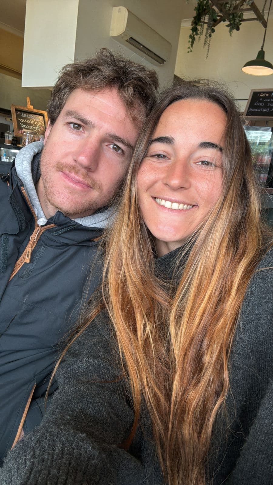 Cristian and his partner in a cafe